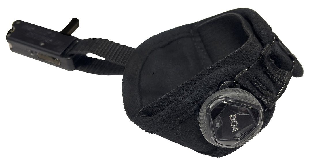 Back Strap Tension-Activated Wrist Release